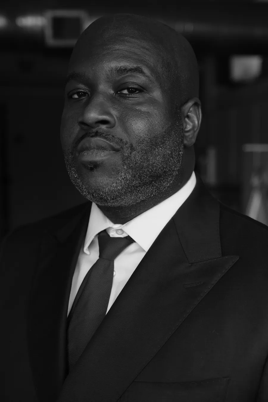 C. Patrick Ngwolo, counsel for high-profile matters, black-and-white portrait