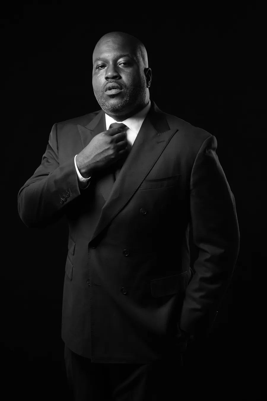 C. Patrick Ngwolo, black-and-white editorial portrait